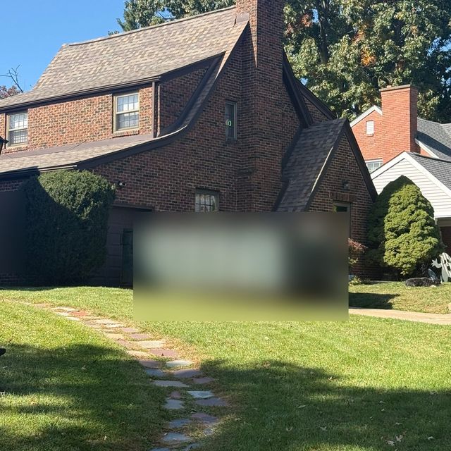 Finished asphalt shingle roof on a brick home in South Hills, Pittsburgh, PA.
